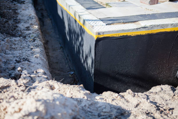 Professional Waterproofing technician working in Carbon Hill, OH